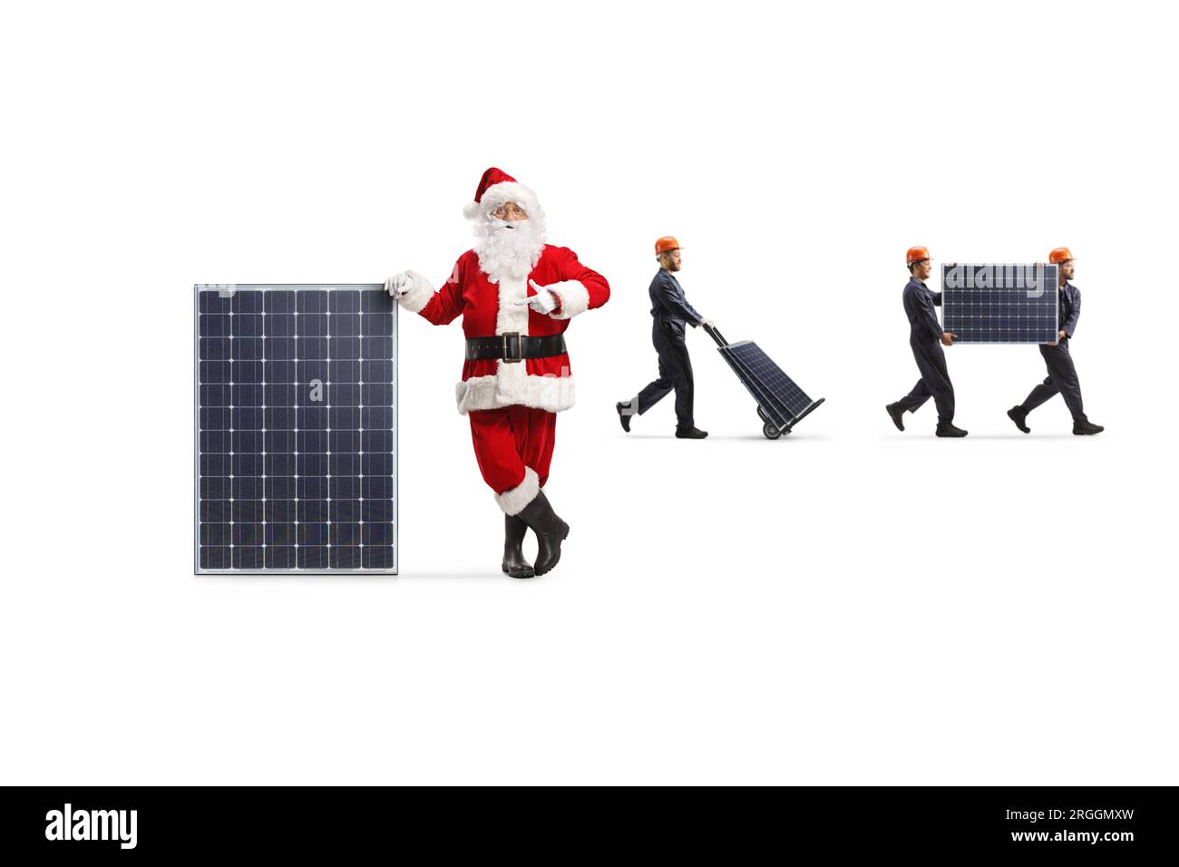 Santa claus pointing at a panel and factory workers carrying photovoltaic cells isolated on white background Stock Photo