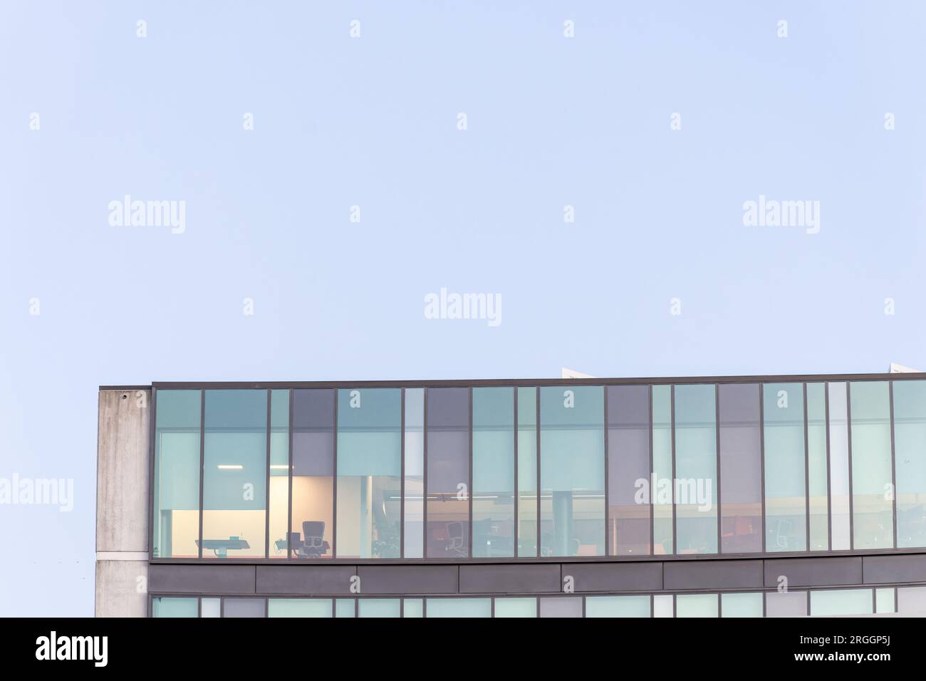 Modern architecture glass facade with office and blue sky Stock Photo ...