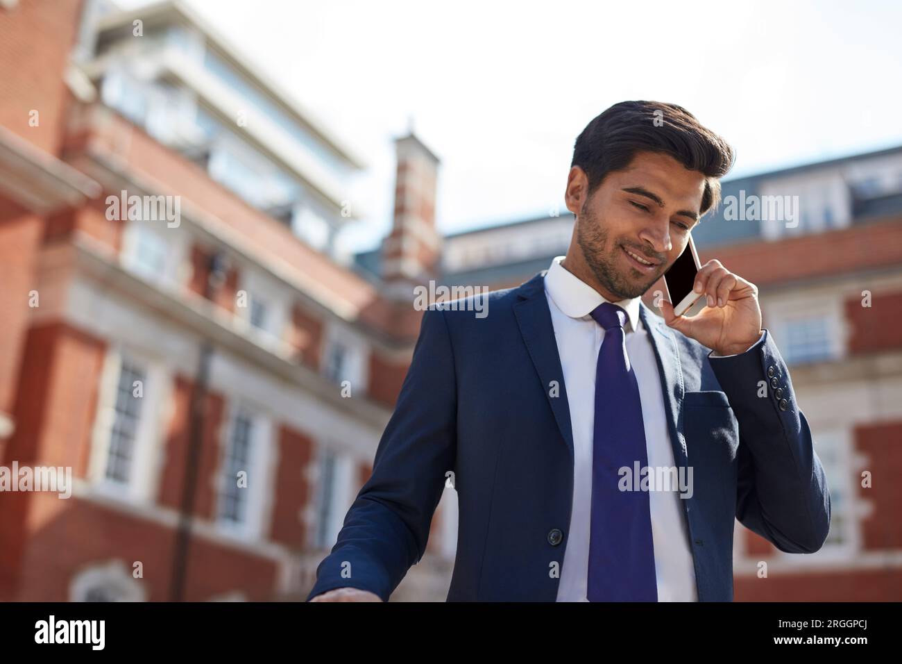 Businessman talking on smart phone Stock Photo