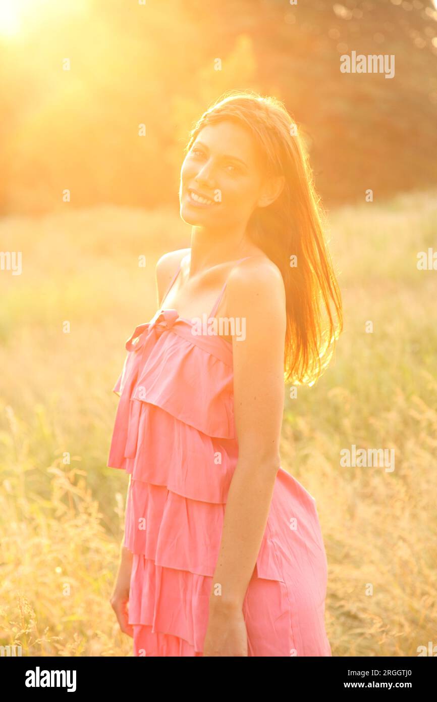 Wearing pink dress hi-res stock photography and images - Alamy
