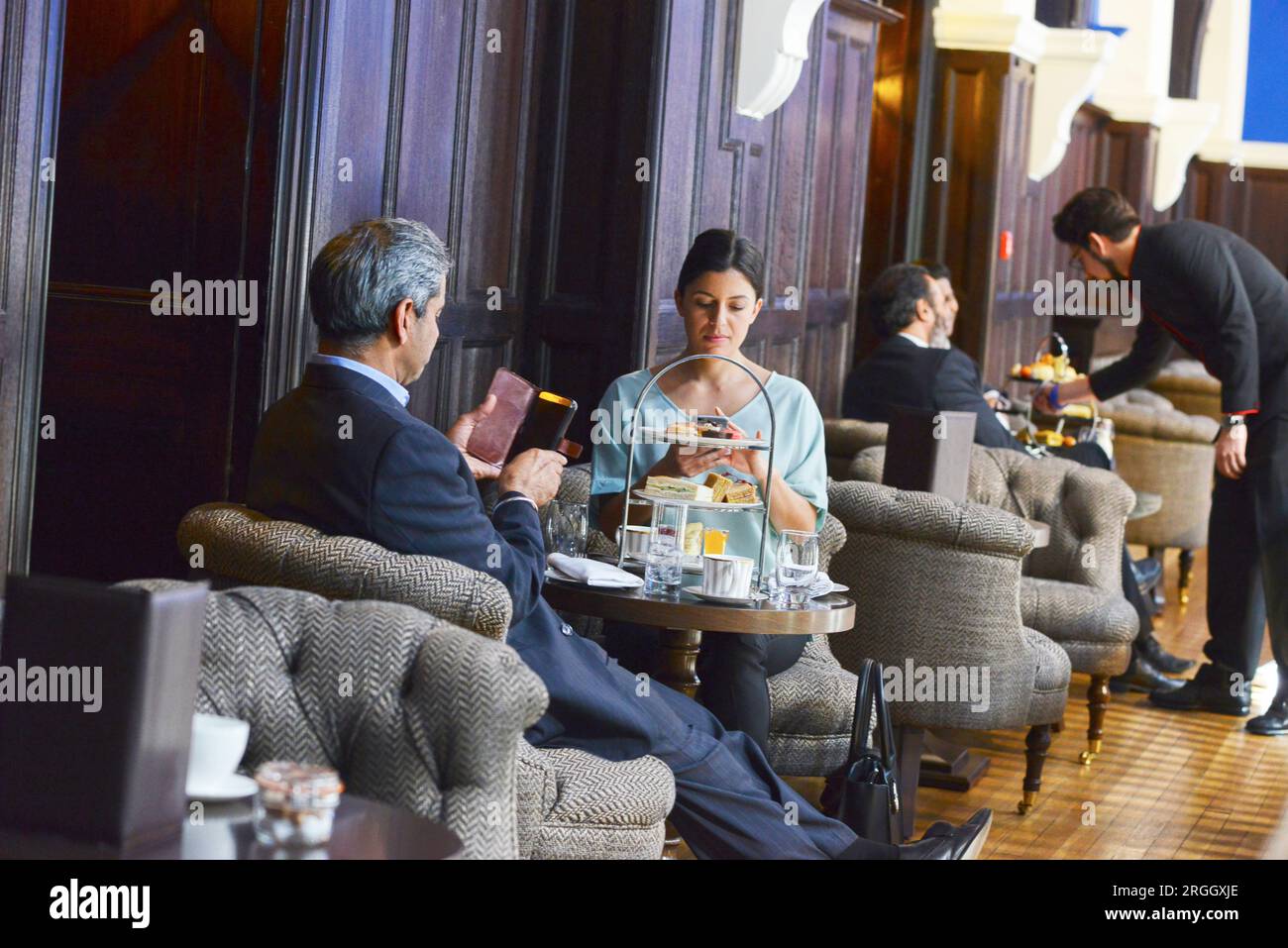 Businesspeople meeting at cafe Stock Photo