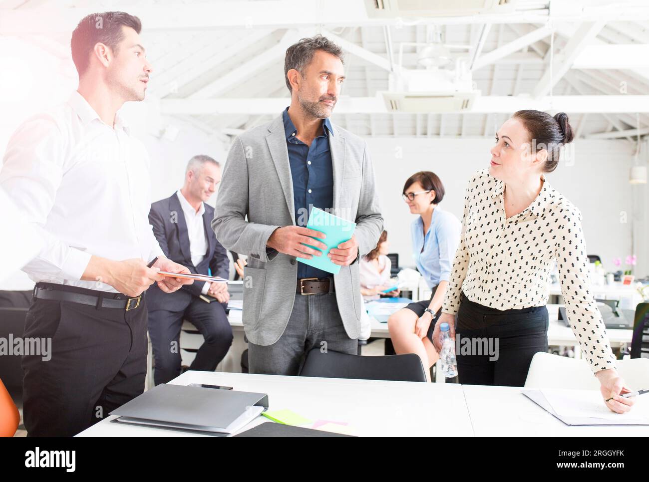 Businesspeople working together in office Stock Photo
