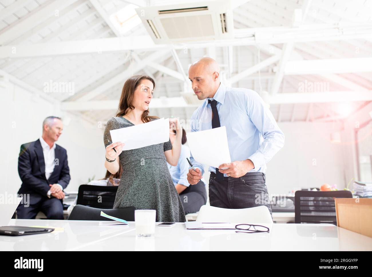 Businesspeople working together in office Stock Photo