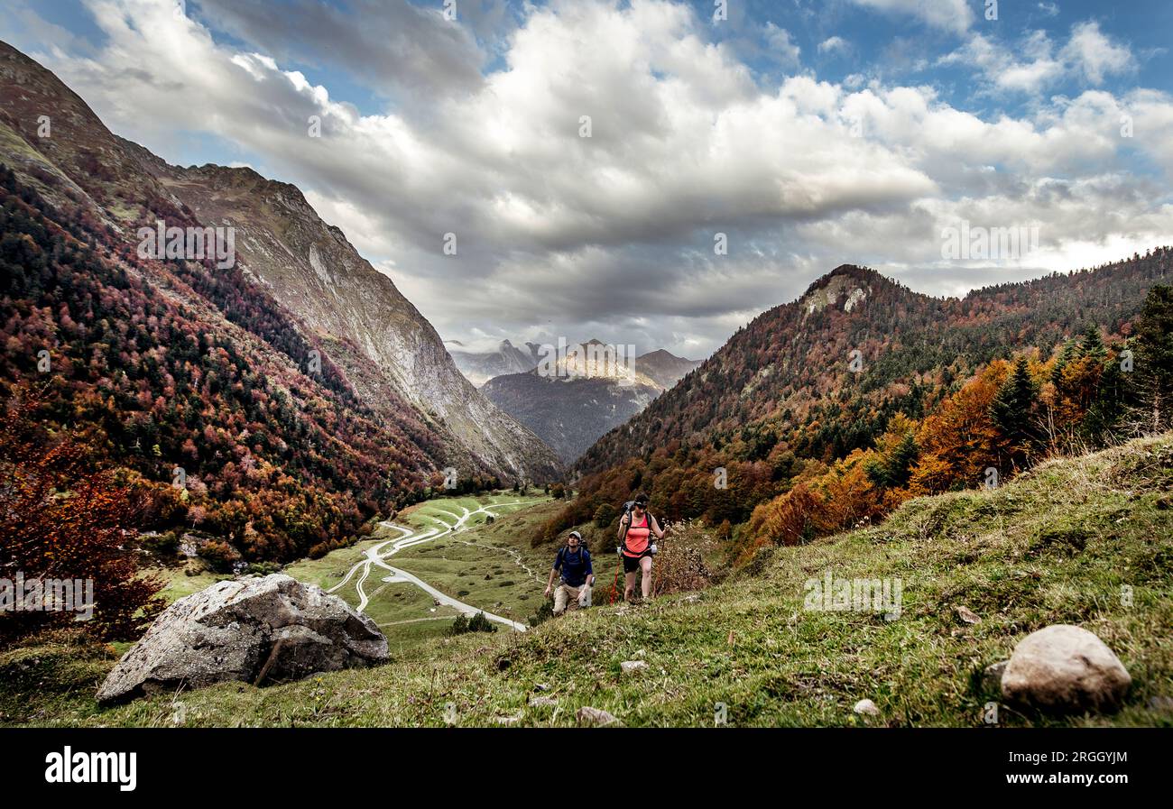 Young couple hiking in mountains Stock Photo