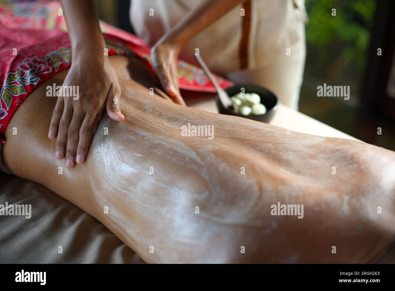 Massage therapy session in progress Stock Photo