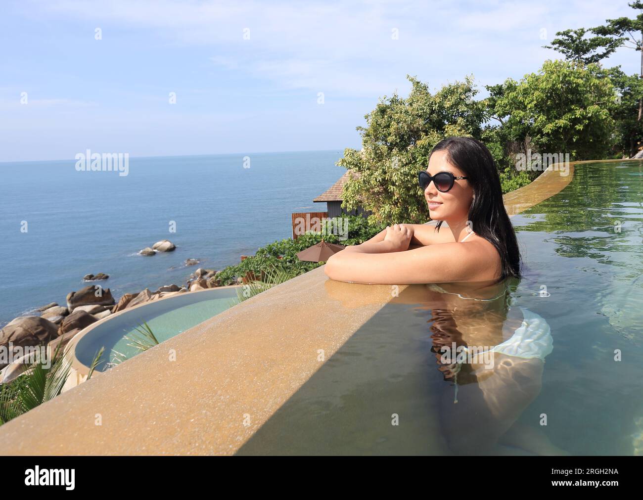 Woman in swimming pool hi-res stock photography and images - Alamy