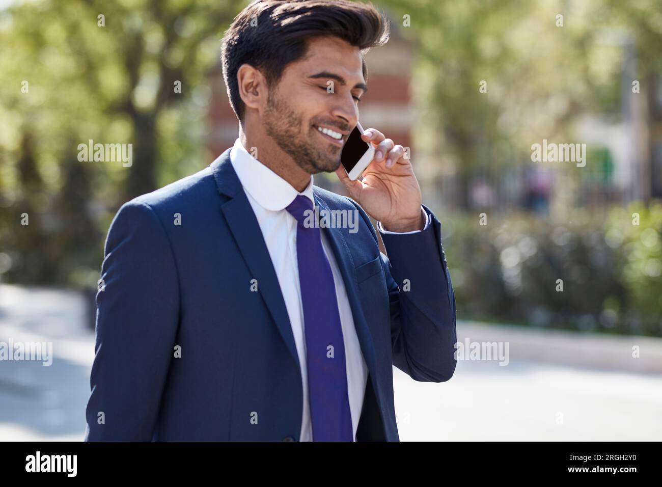 Businessman talking on smart phone Stock Photo