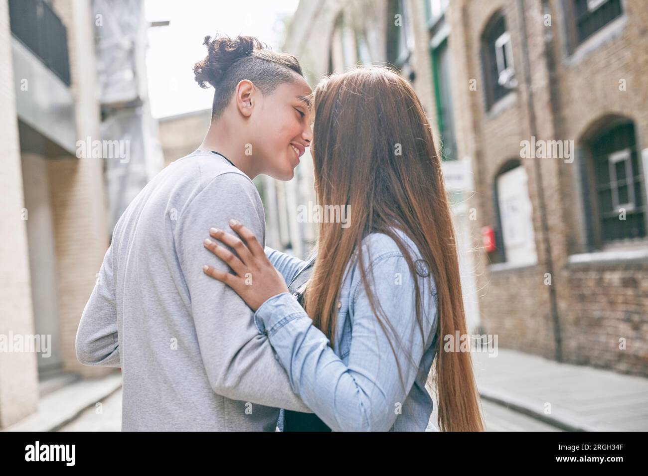 Teenage couple embracing Stock Photo