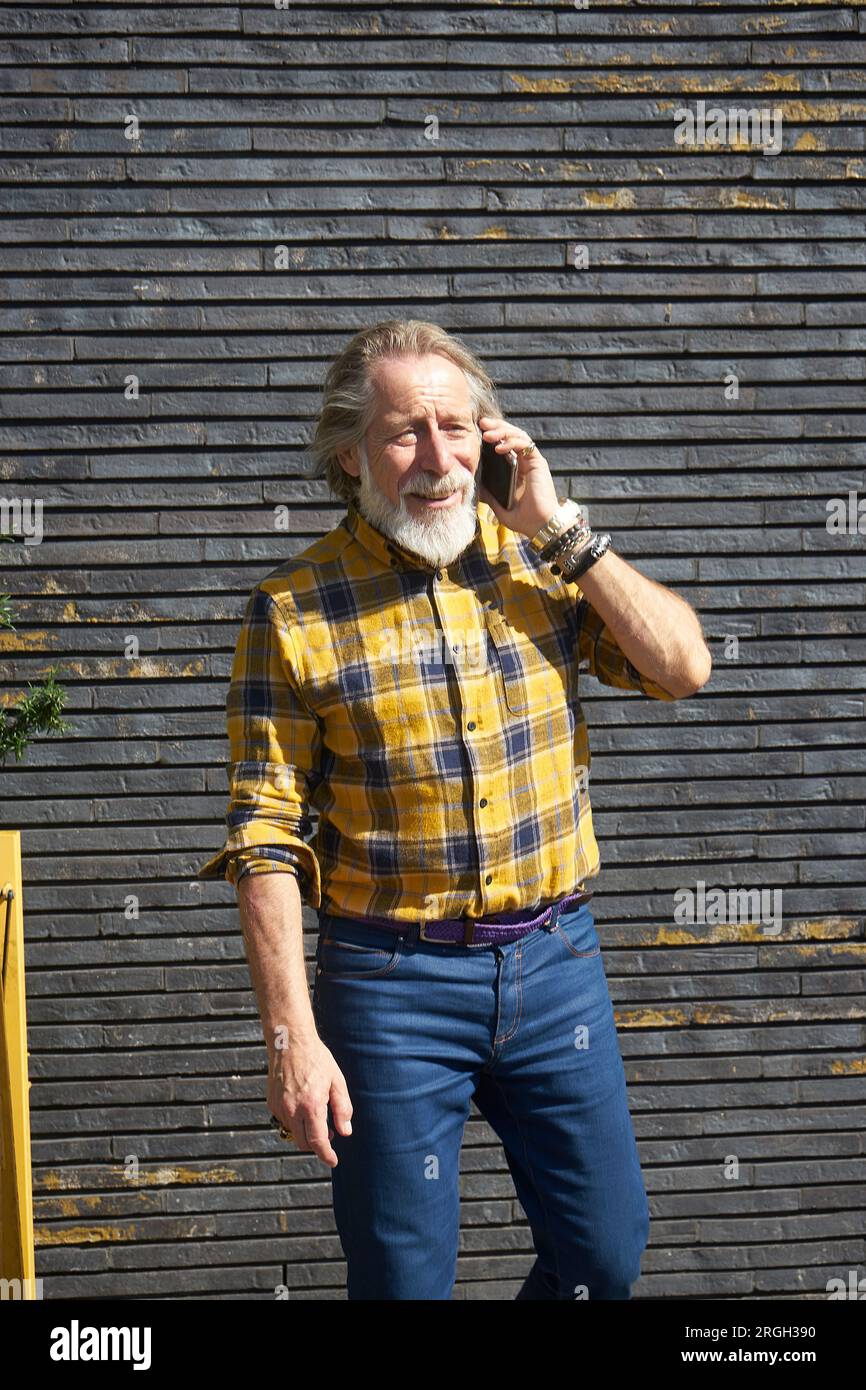Senior man on phone call Stock Photo