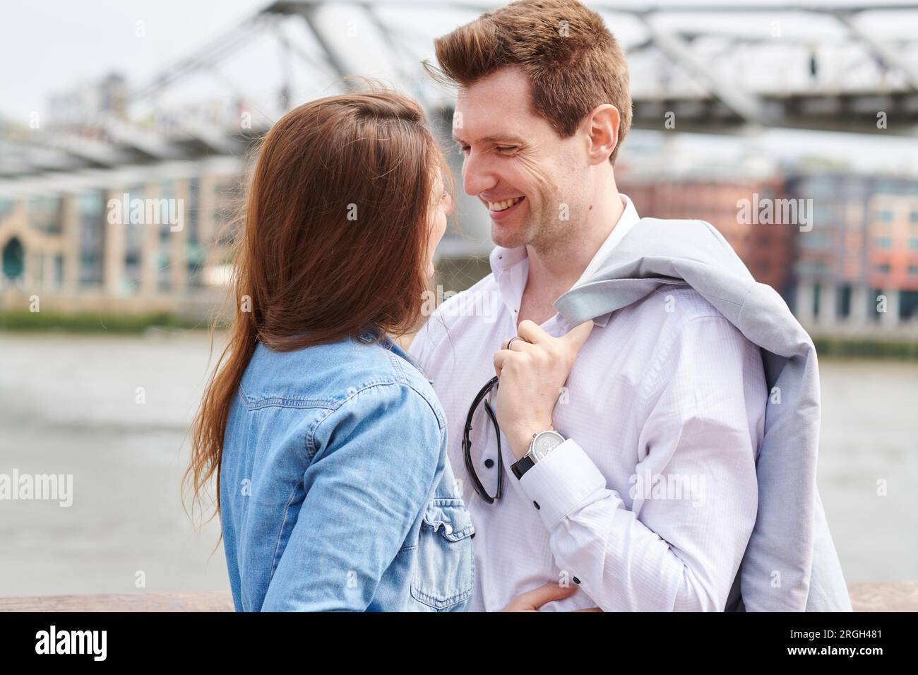 Mid adult couple smiling at each other Stock Photo