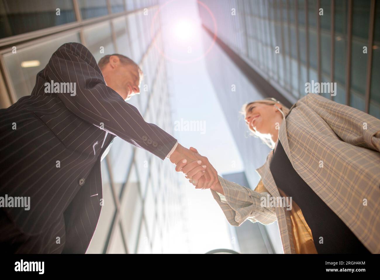 Low angle view of businesspeople shaking hands Stock Photo