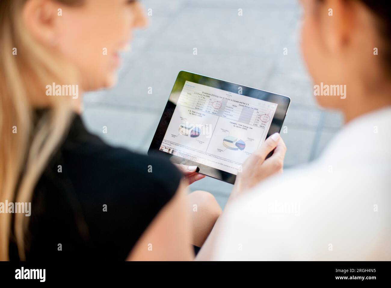 Businesswomen using digital tablet Stock Photo