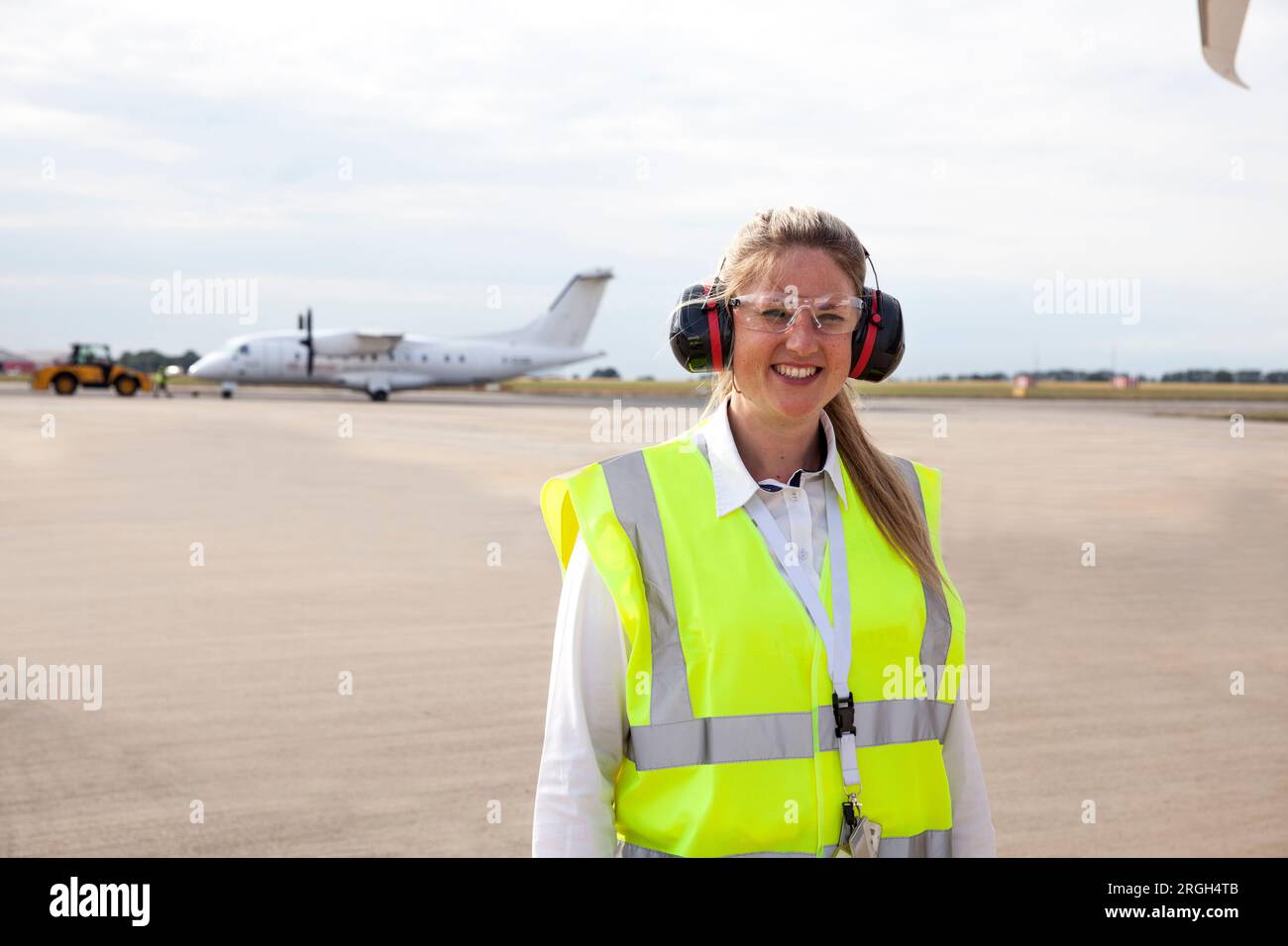 Female ear muffs airplane hires stock photography and images Alamy