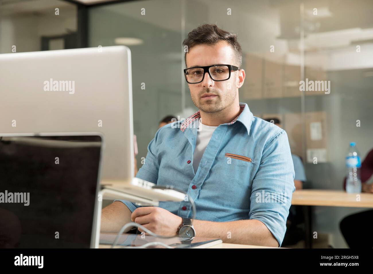 Young man working on laptop Stock Photo