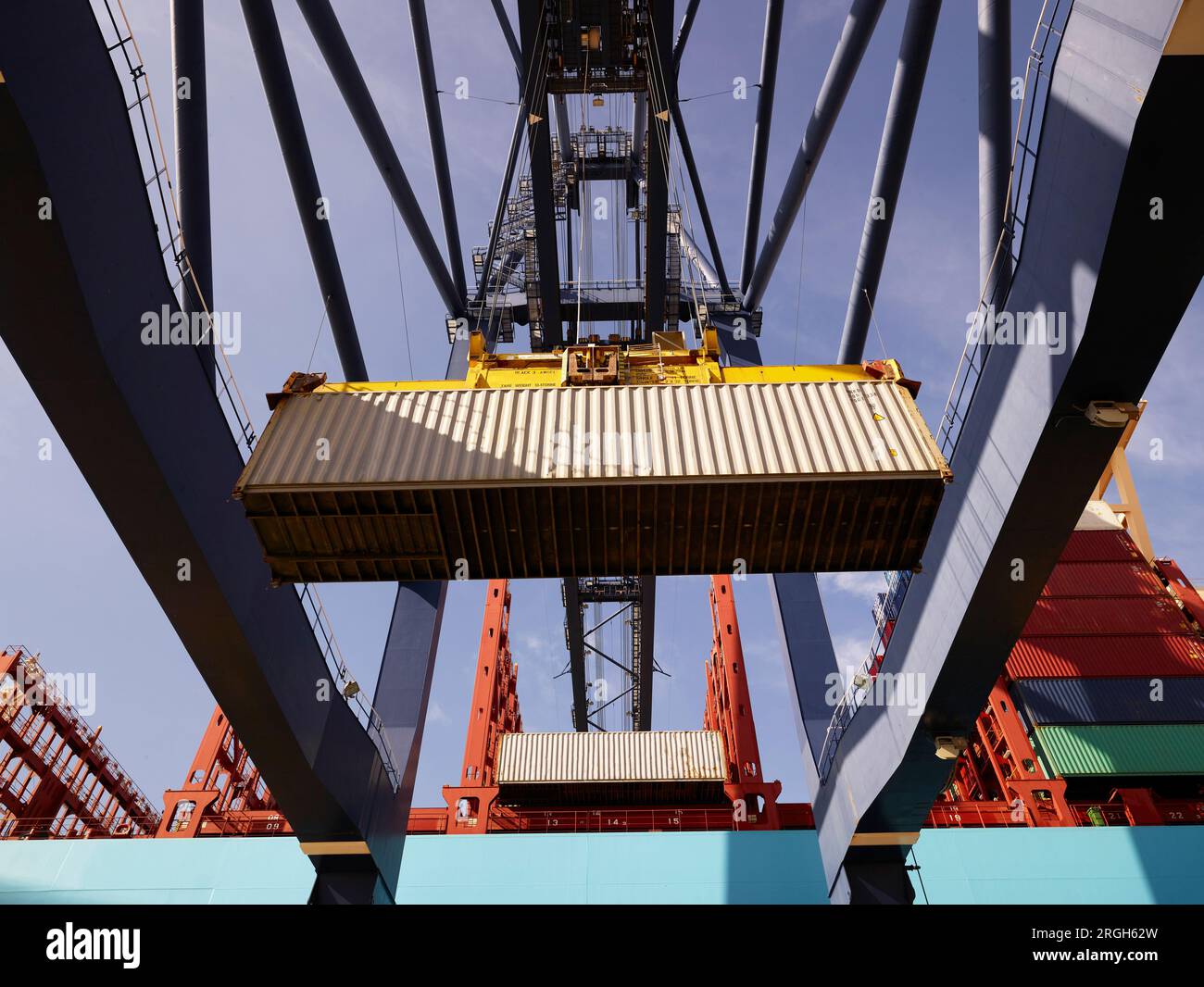 Loading and unloading cargo into and from ships hi-res stock ...