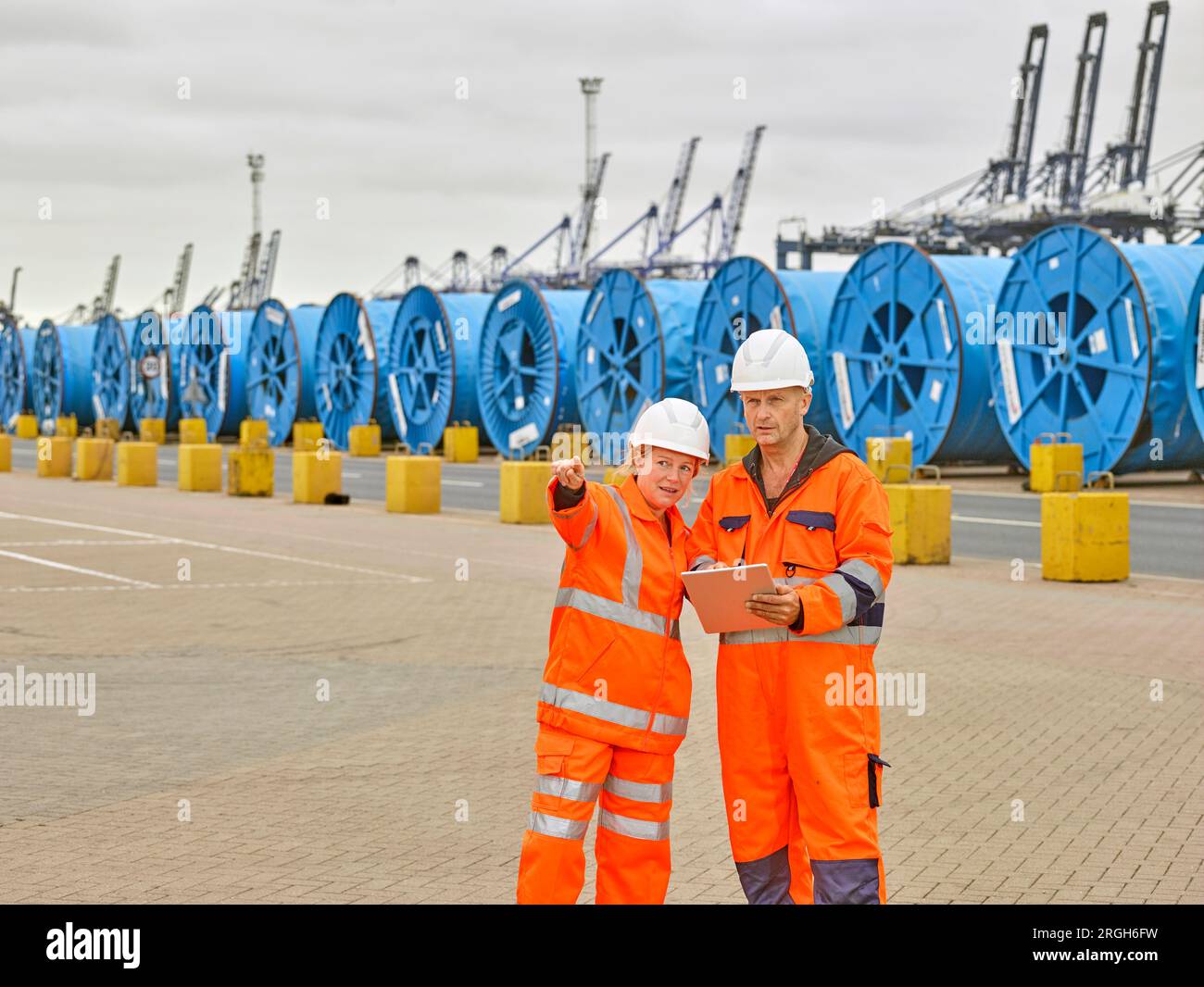 Dock workers with digital tablet at Port of Felixstowe, England Stock ...