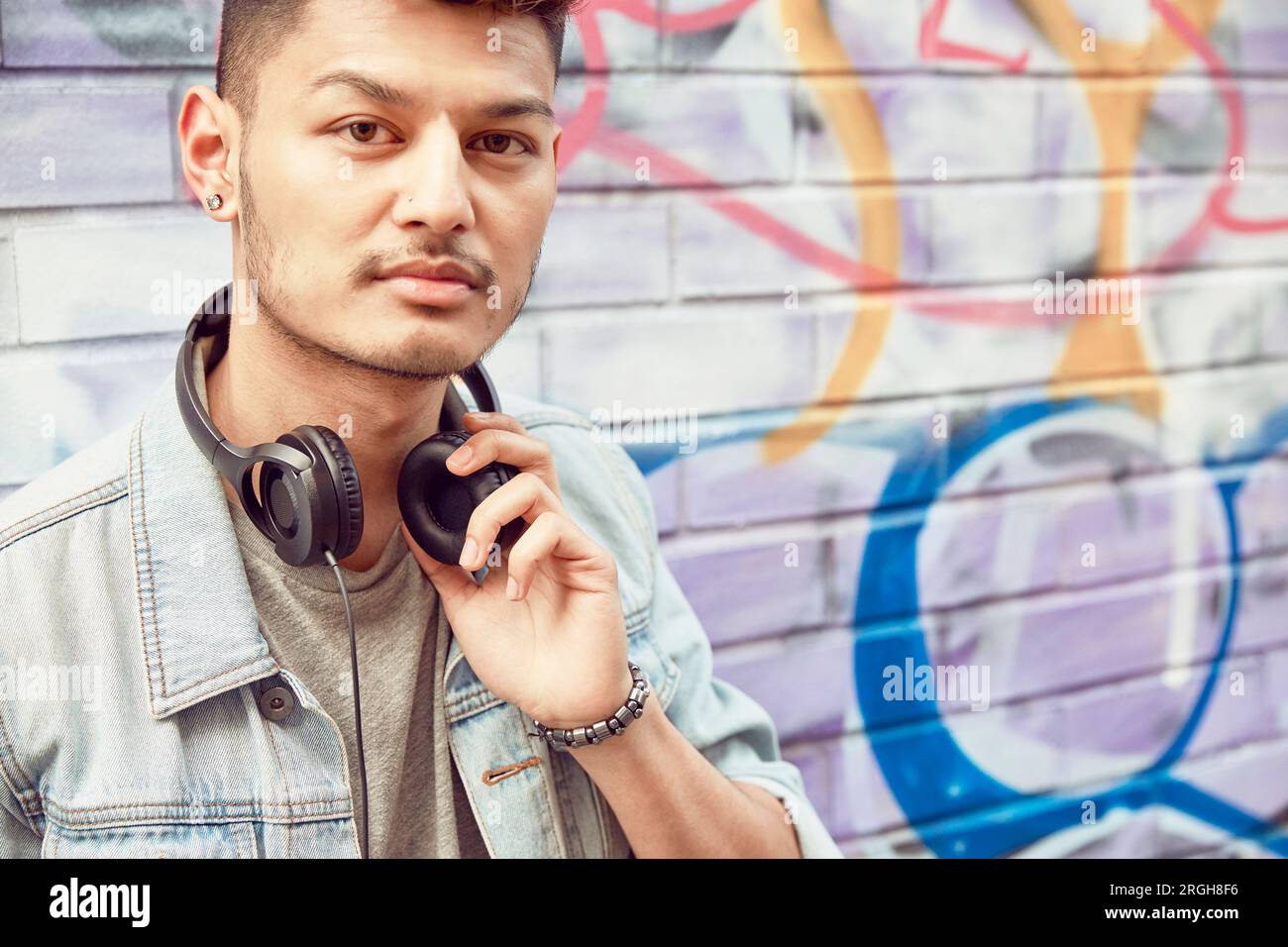 Trendy teenager water bottle headphones hi-res stock photography and images  - Alamy