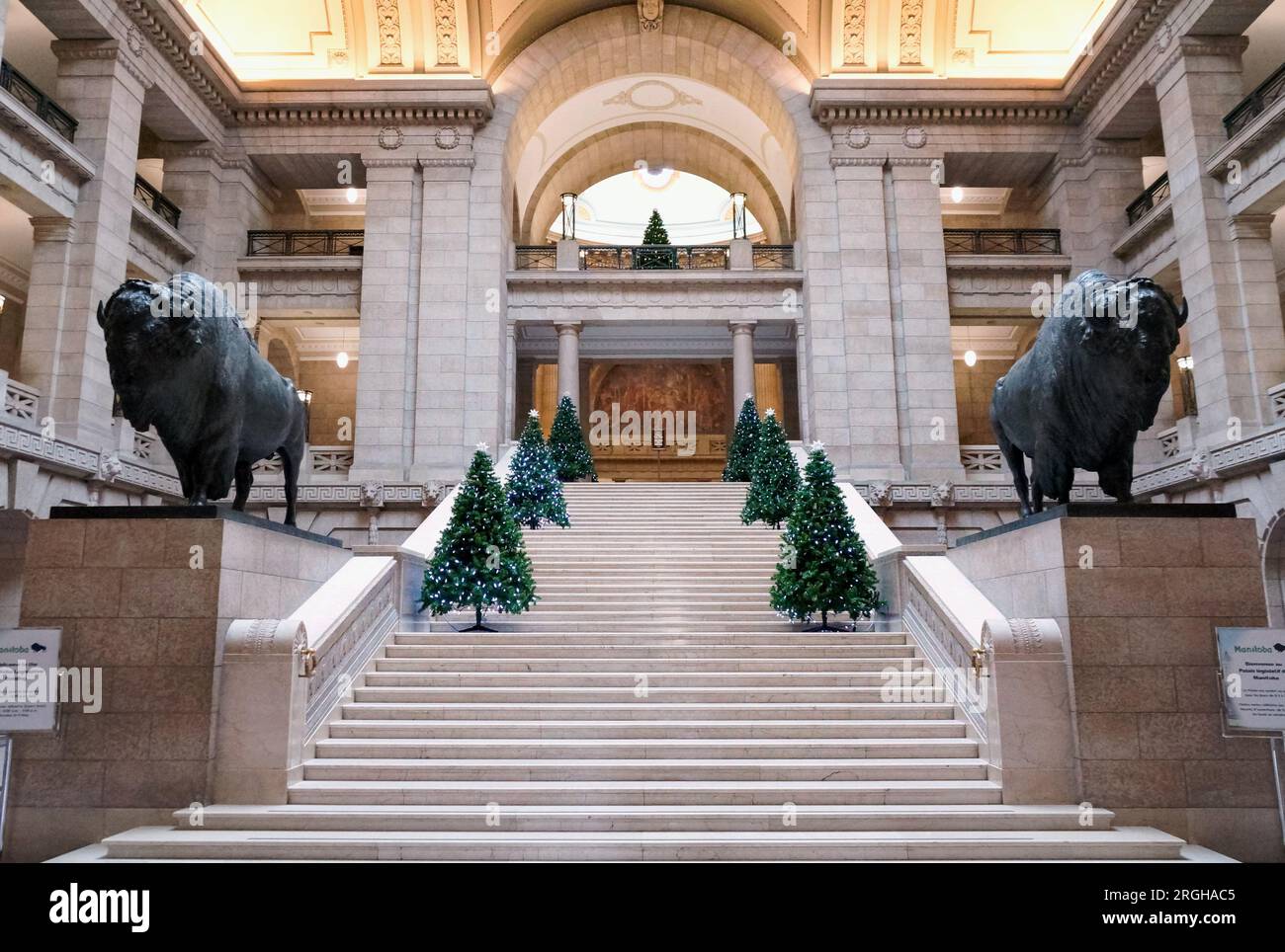 Winnipeg, Manitoba, Canada - 2014-11-21: Part of the interior of Manitoba Legislature building with two life sized bison statues at the base of the Stock Photo