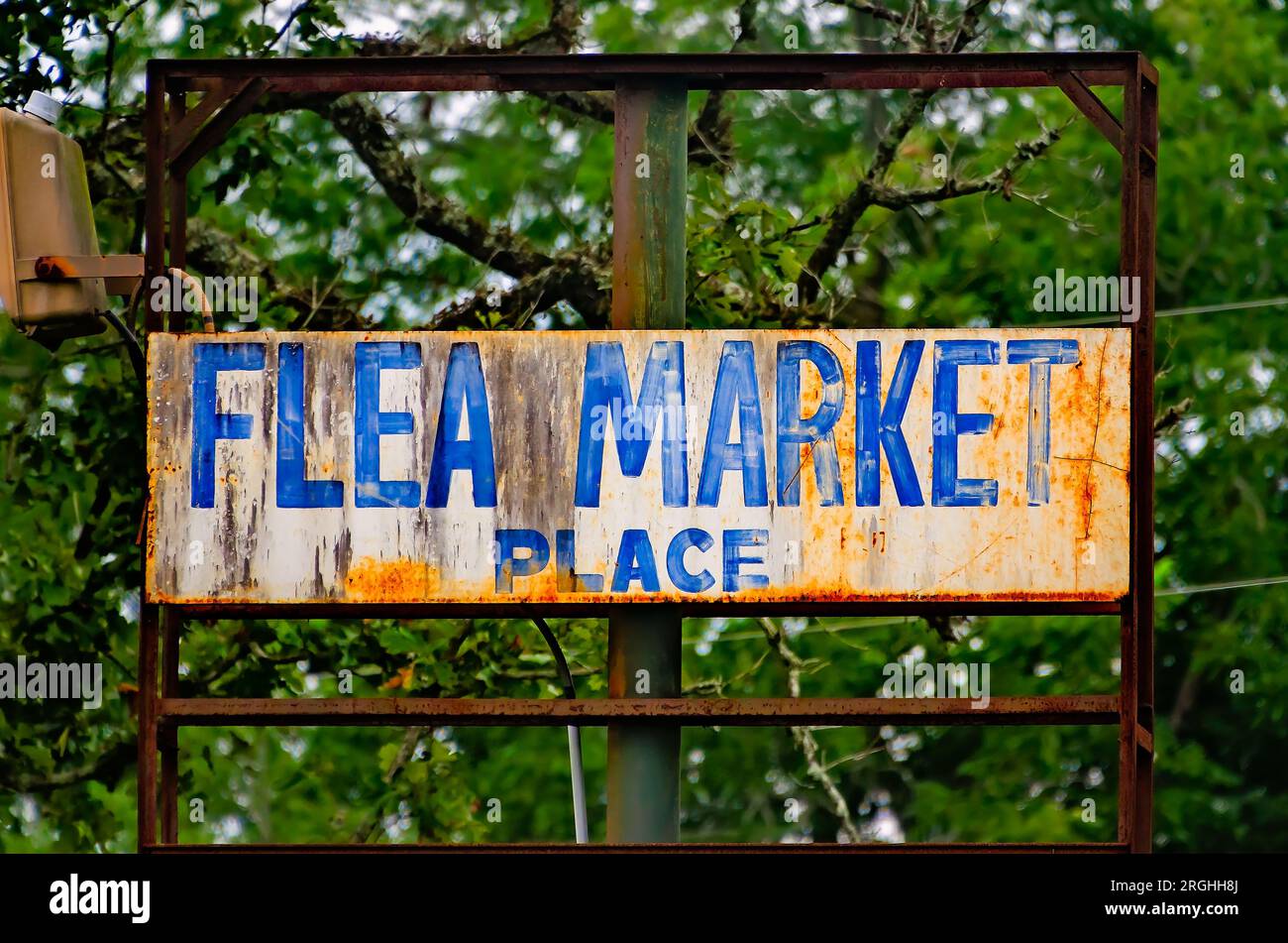 A rusted flea market sign is pictured, Aug. 8, 2023, in Mobile, Alabama