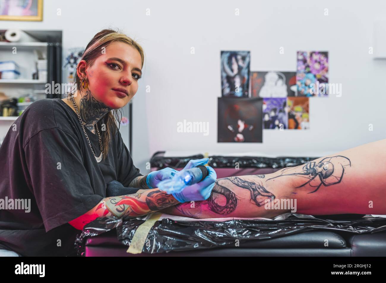 Tattoo artist tattoing client hi-res stock photography and images - Alamy
