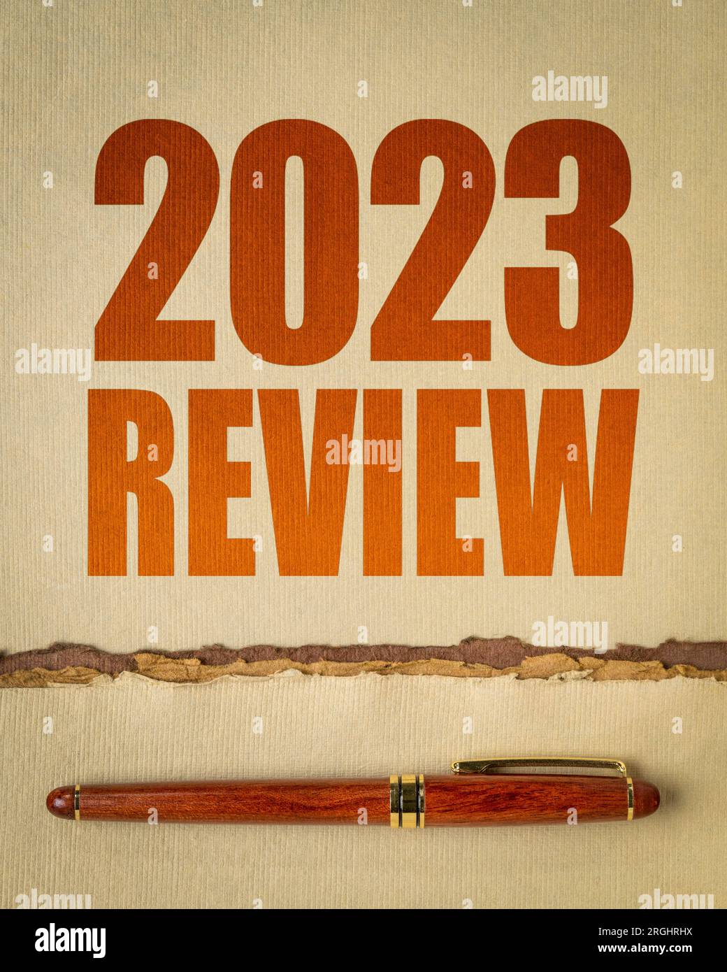 2023 year review word abstract on art paper with a pen, end of year