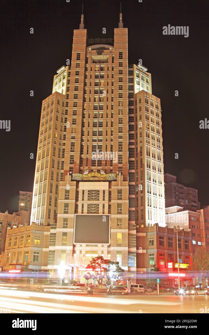 high rise building in the city at night Stock Photo - Alamy