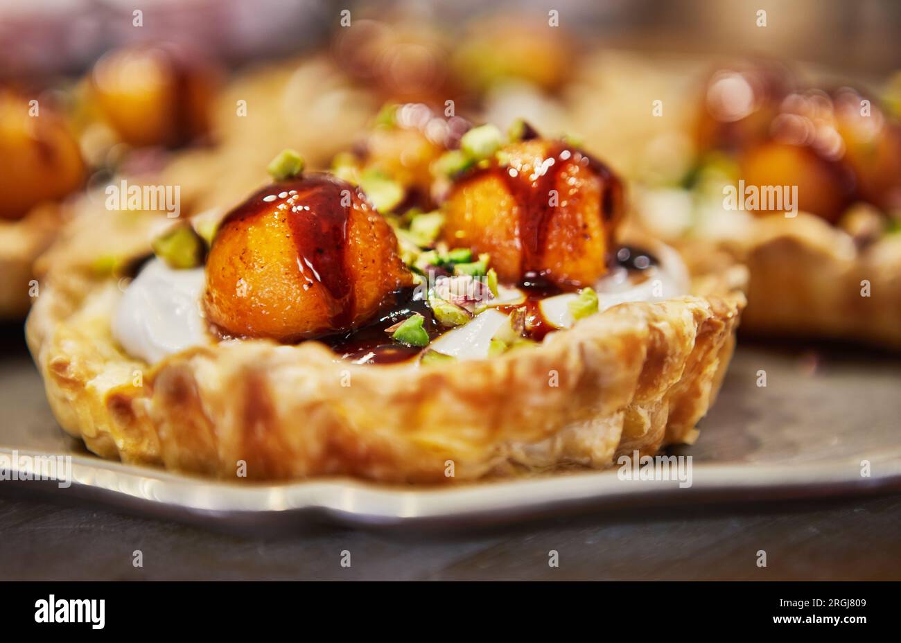 Summer sweetness, melon and caramel dessert baskets with cream. Melon