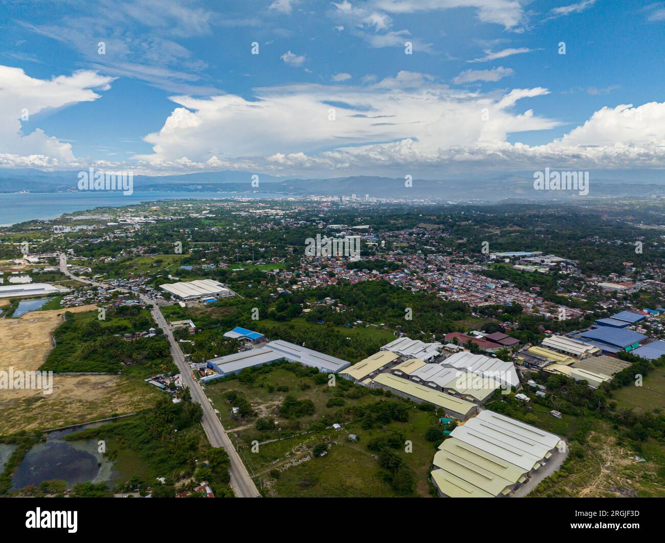 Cagayan de Oro: Busy city in daytime, residential area and commercial buildings. Northern Mindanao, Philippines. Cityscape. Stock Photo
