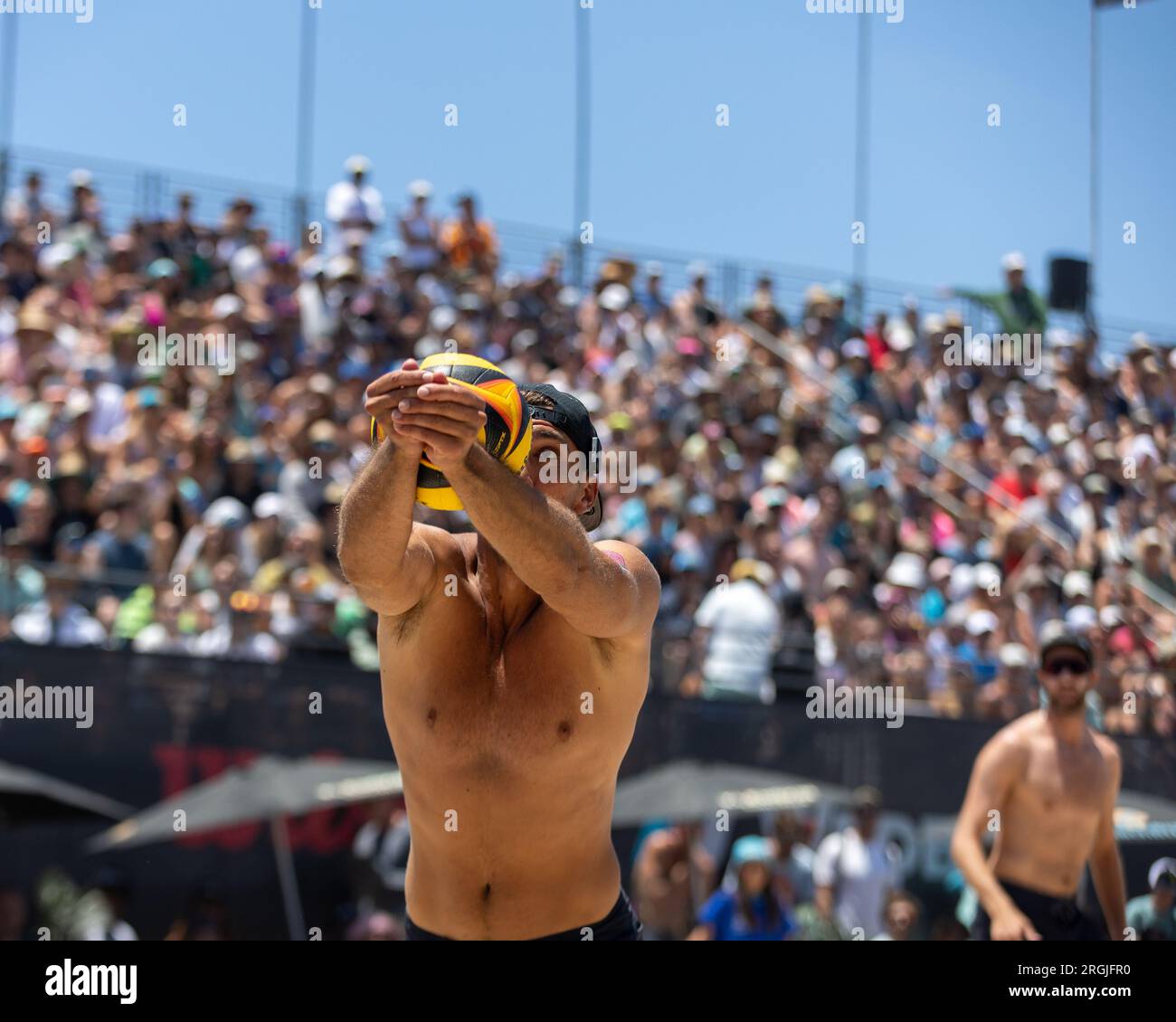 Trevor Crabb chases down the ball during the AVP Hermosa Beach Open on 9 July 2023. (John