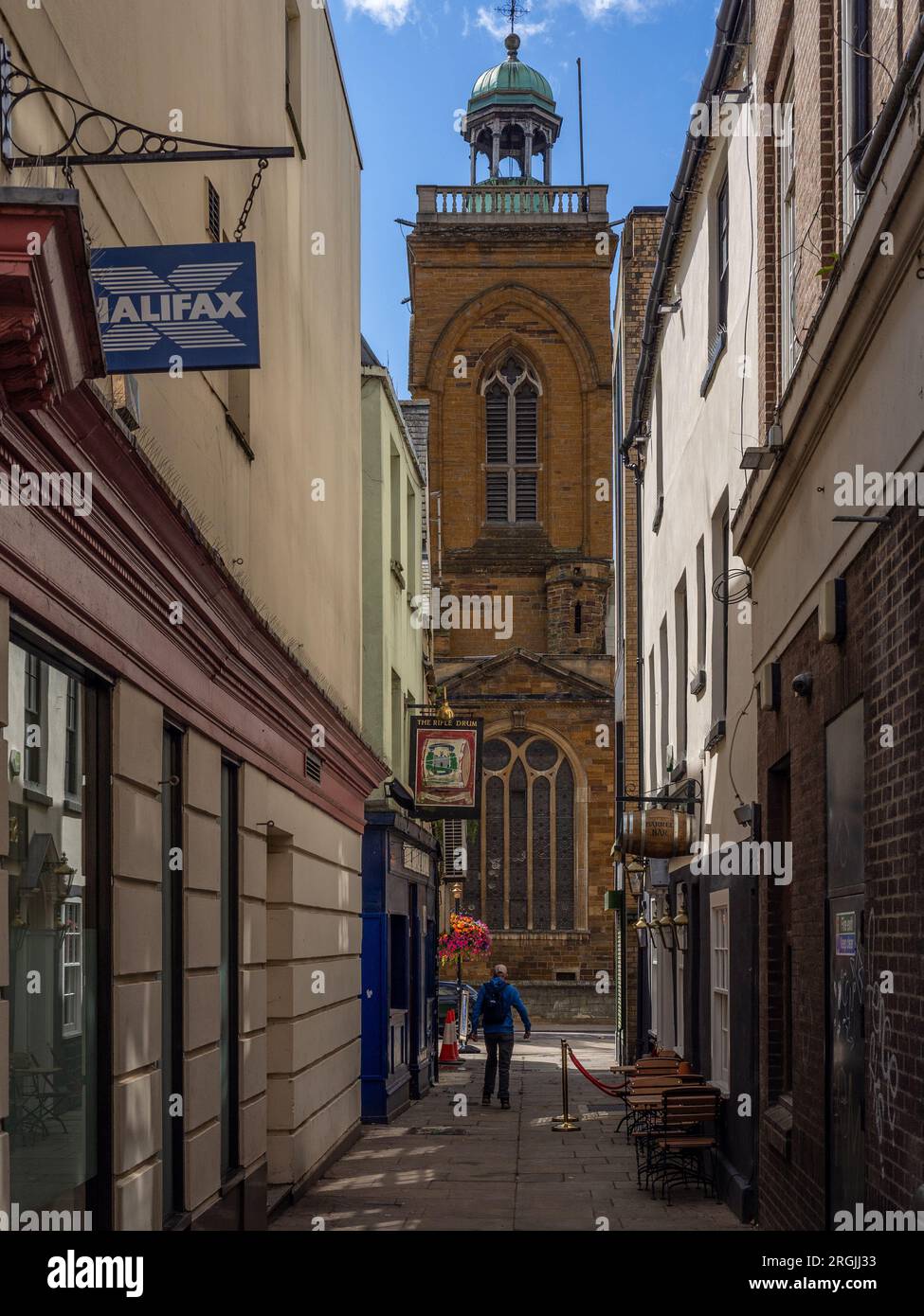 Drum Lane, a narrow pedestrian alley, leading from the Market Square to All Saints church, Northampton, UK Stock Photo
