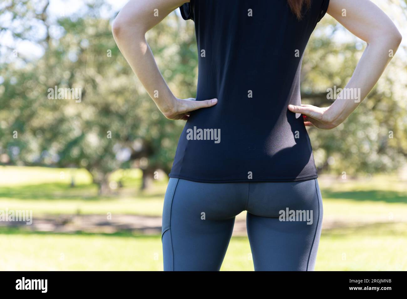 Woman with nice figure in tight leggings - back view Stock Photo - Alamy