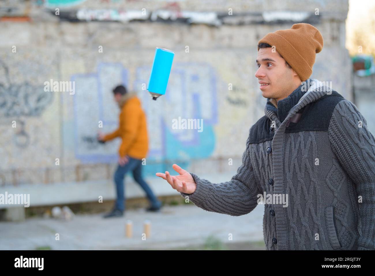 Graffiti artist holding spray can hi-res stock photography and images ...