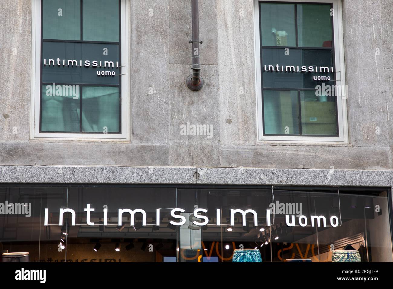 Milan , Italy - 08 07 2023 : intimissimi uomo logo brand and text sign on  entrance facade store chain signage fashion city street Stock Photo - Alamy