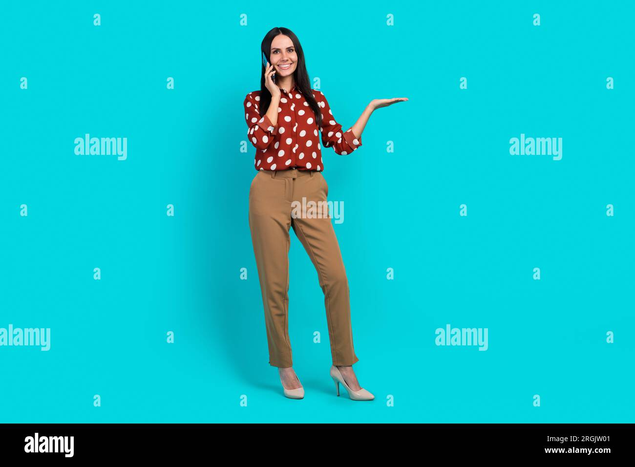 Full body photo of charming cheerful lady communicate telephone arm ...
