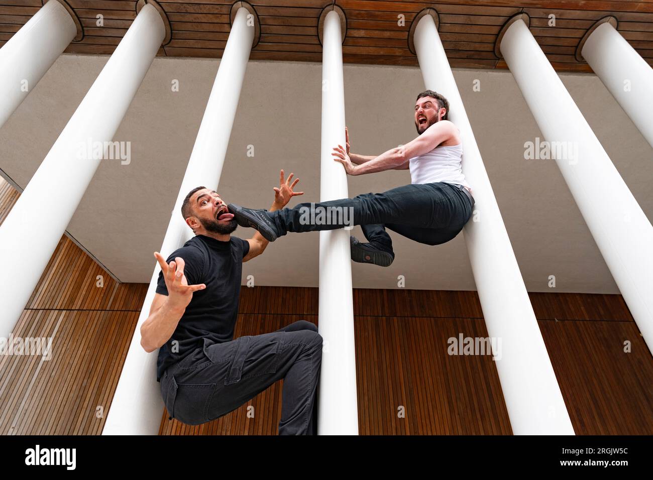 Edinburgh, Scotland, UK. 10th August 2023.  Performers David Banks and Sadiq Ali act out stuntman scenes from the movies. Their show Stuntman looks at the impact of action-hero role models on men and boys by taking inspiration from movies such as Die Hard and John Wick. The show is running at Summerhall.  Iain Masterton/Alamy Live News Stock Photo