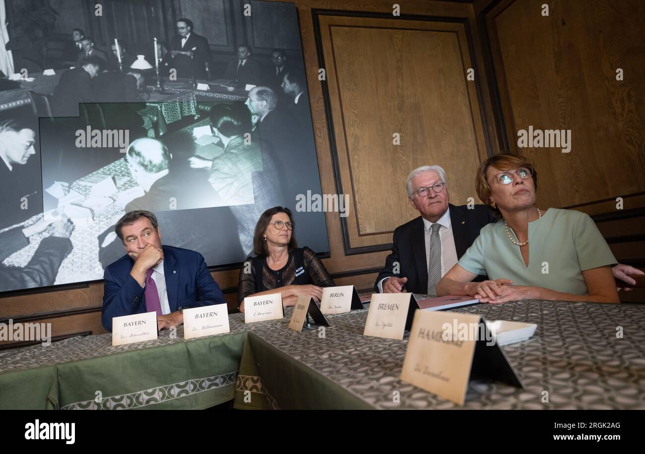 Herrenchiemsee, Germany. 10th Aug, 2023. Markus Söder (l-r, CSU), Prime Minister of Bavaria, Ilse Aigner, President of the Bavarian State Parliament, Federal President Frank-Walter Steinmeier and his wife Elke Büdenbender have the exhibition in the New Palace explained to them on the occasion of the 75th anniversary of the Herrenchiemsee Constitutional Convention. Credit: Peter Kneffel/dpa/Alamy Live News Stock Photo