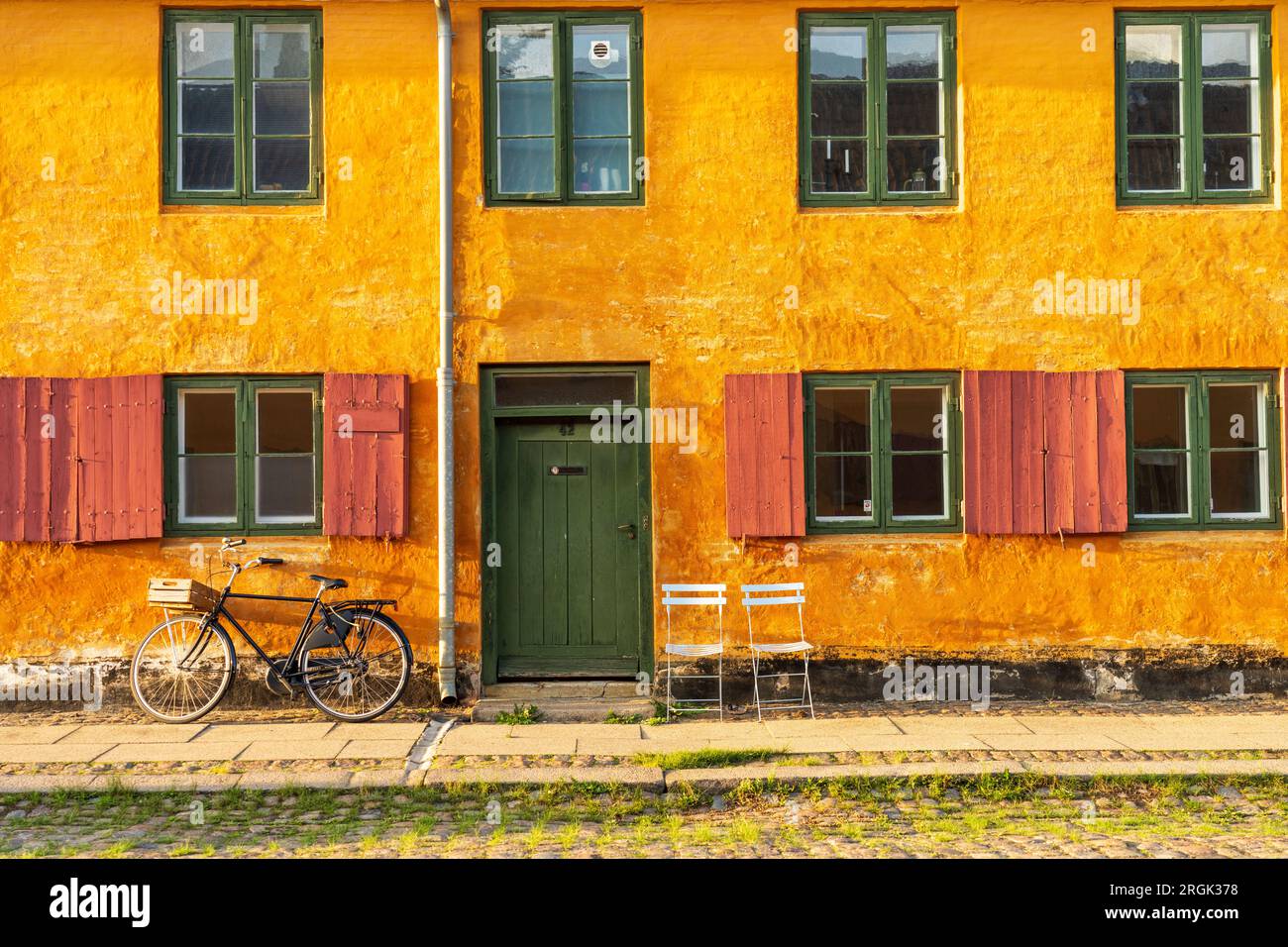 Colorful old wall with bicycle Stock Photo