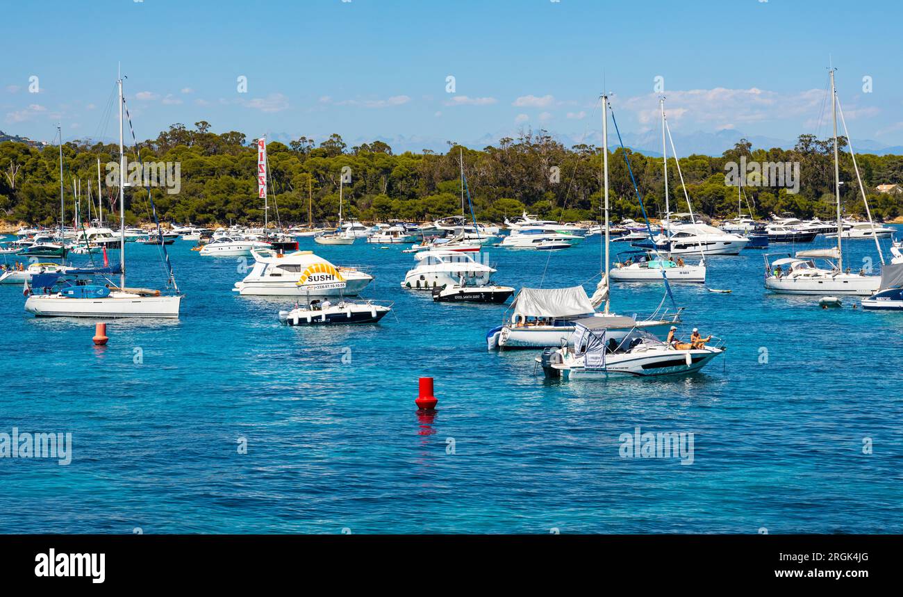 Cannes, France July 31, 2022 Ile Sainte Marguerite island panorama with yachts on