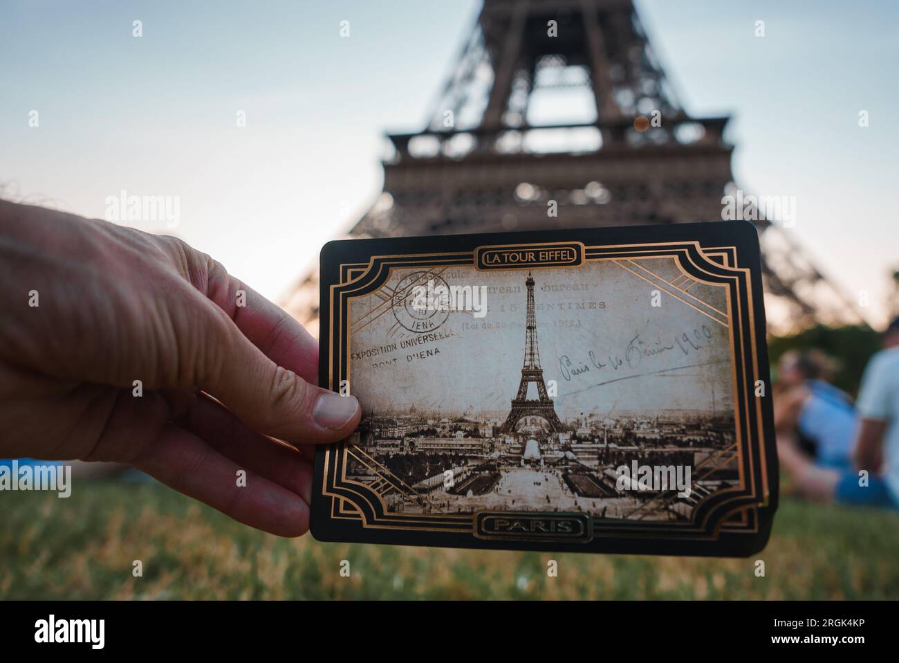 Happy Person Holding Eiffel Tower Photo Stock Photo
