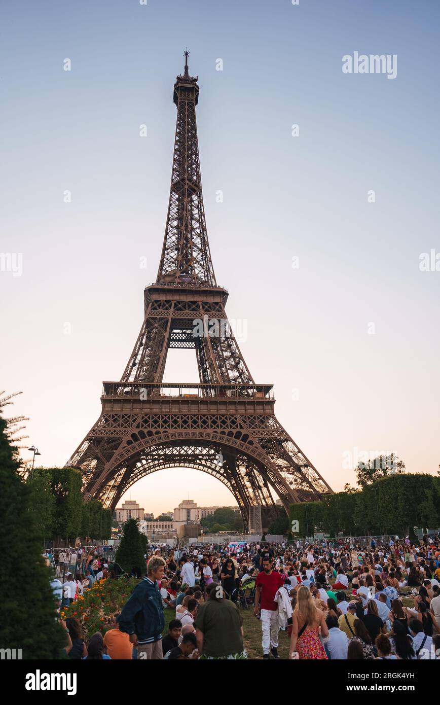 Eiffel Tower at Dusk with Crowd Stock Photo