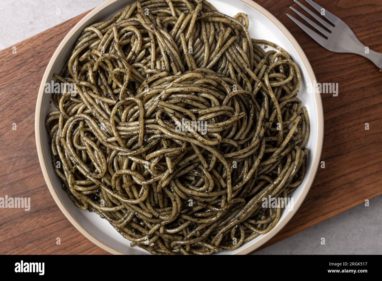 Pasta with Squid Ink Sauce Stock Photo - Alamy