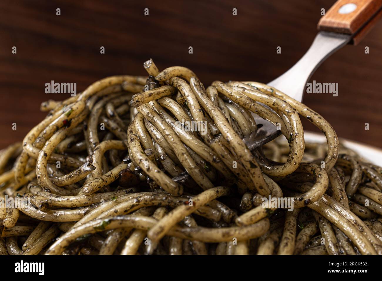Pasta with Squid Ink Sauce Stock Photo - Alamy