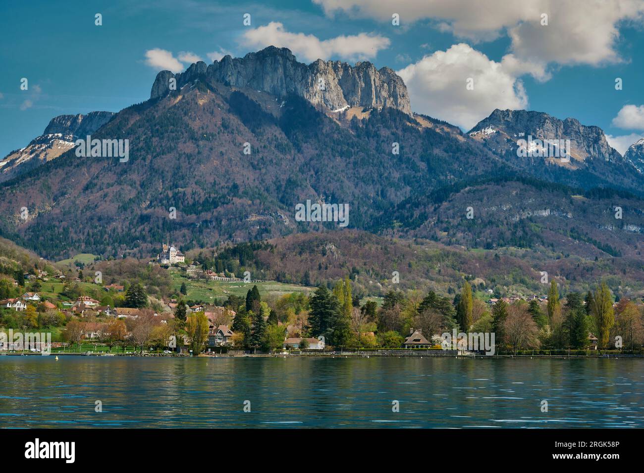 A landscape around Lake Annecy on a sunny day. Lake Annecy is a ...