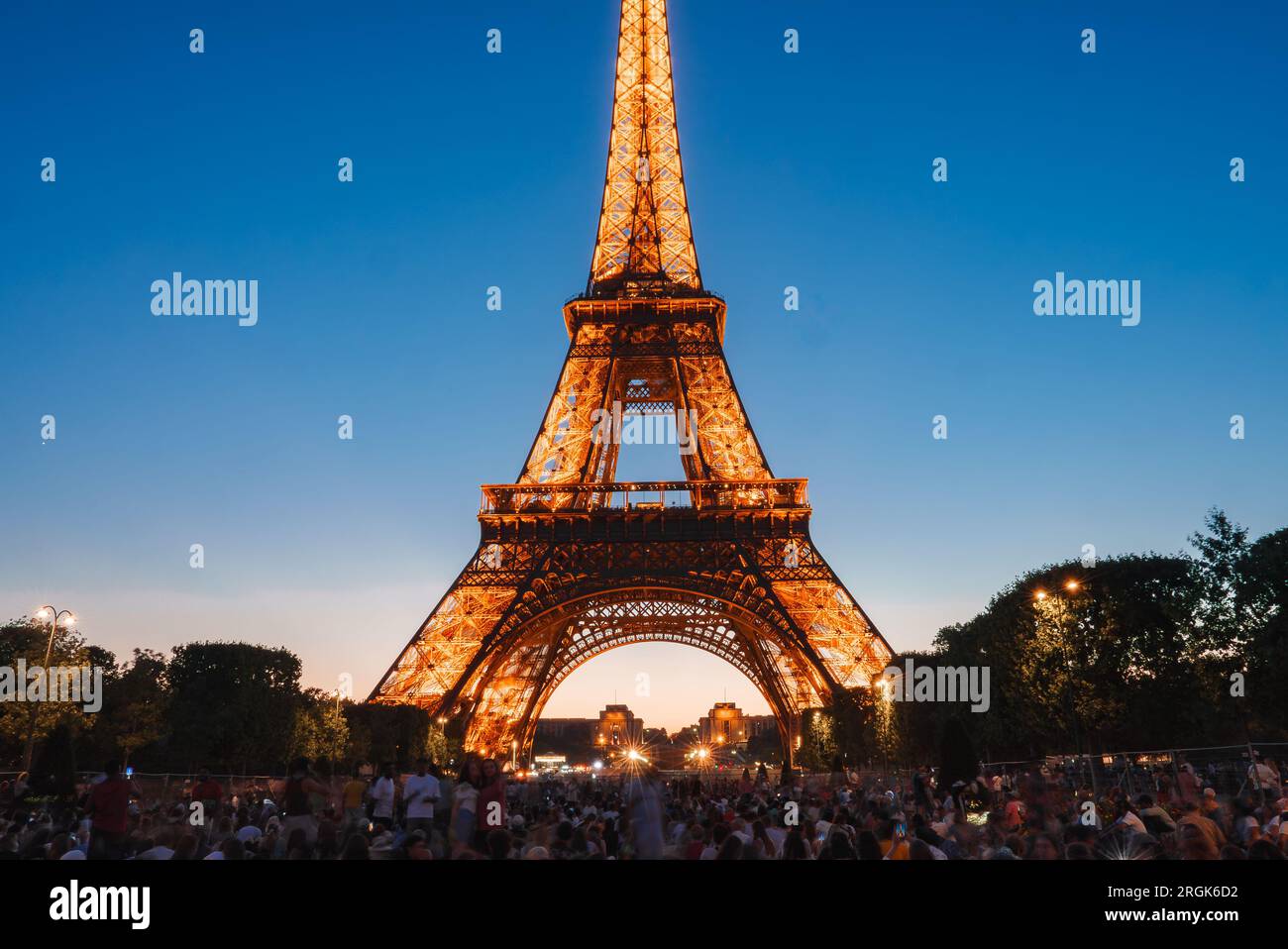 Illuminated Eiffel Tower at Night Stock Photo
