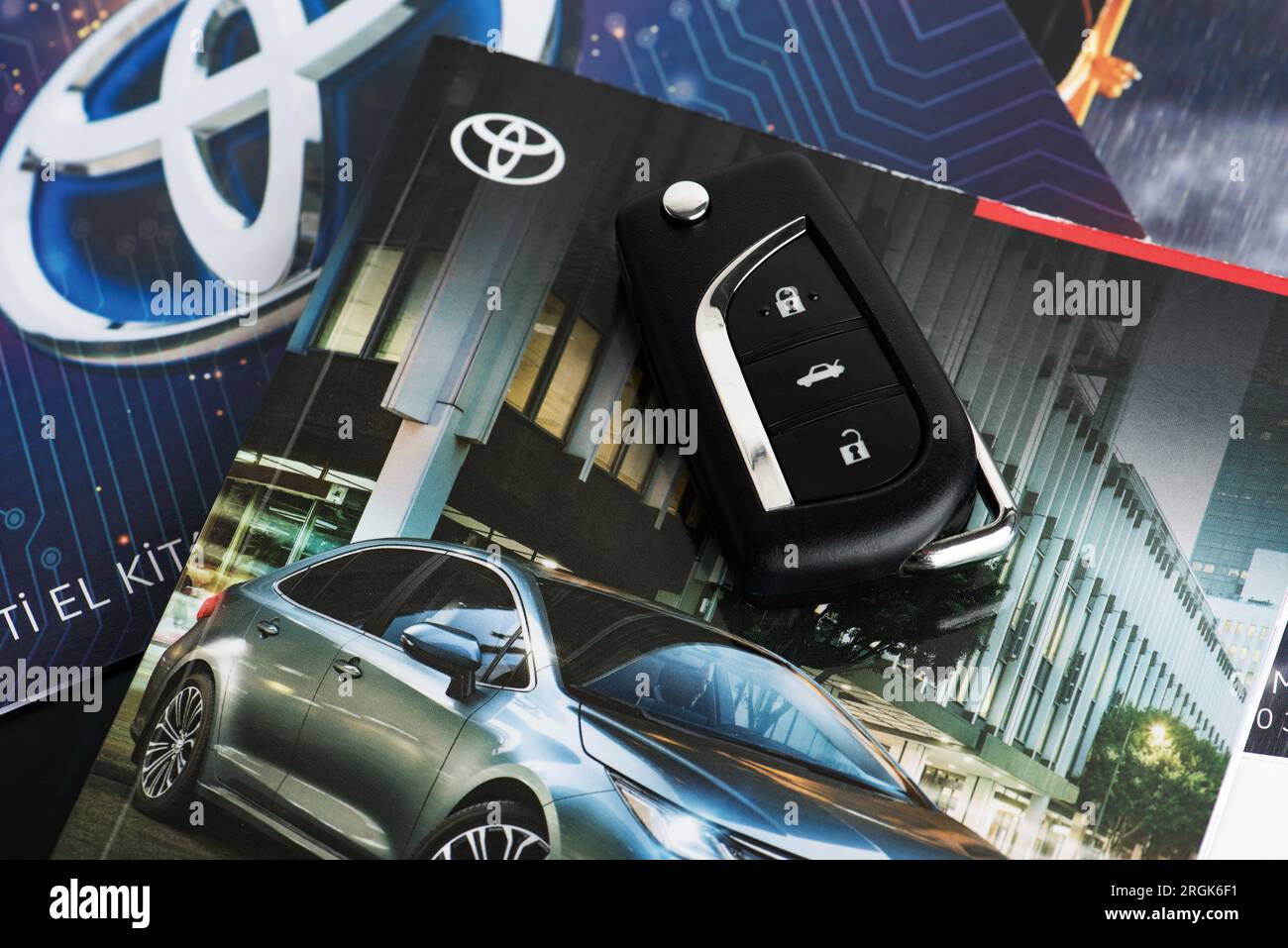 Istanbul, Turkey - March 18, 2023: Toyota Owners Manual Guide Book and key. Toyota Corolla book. Stock Photo