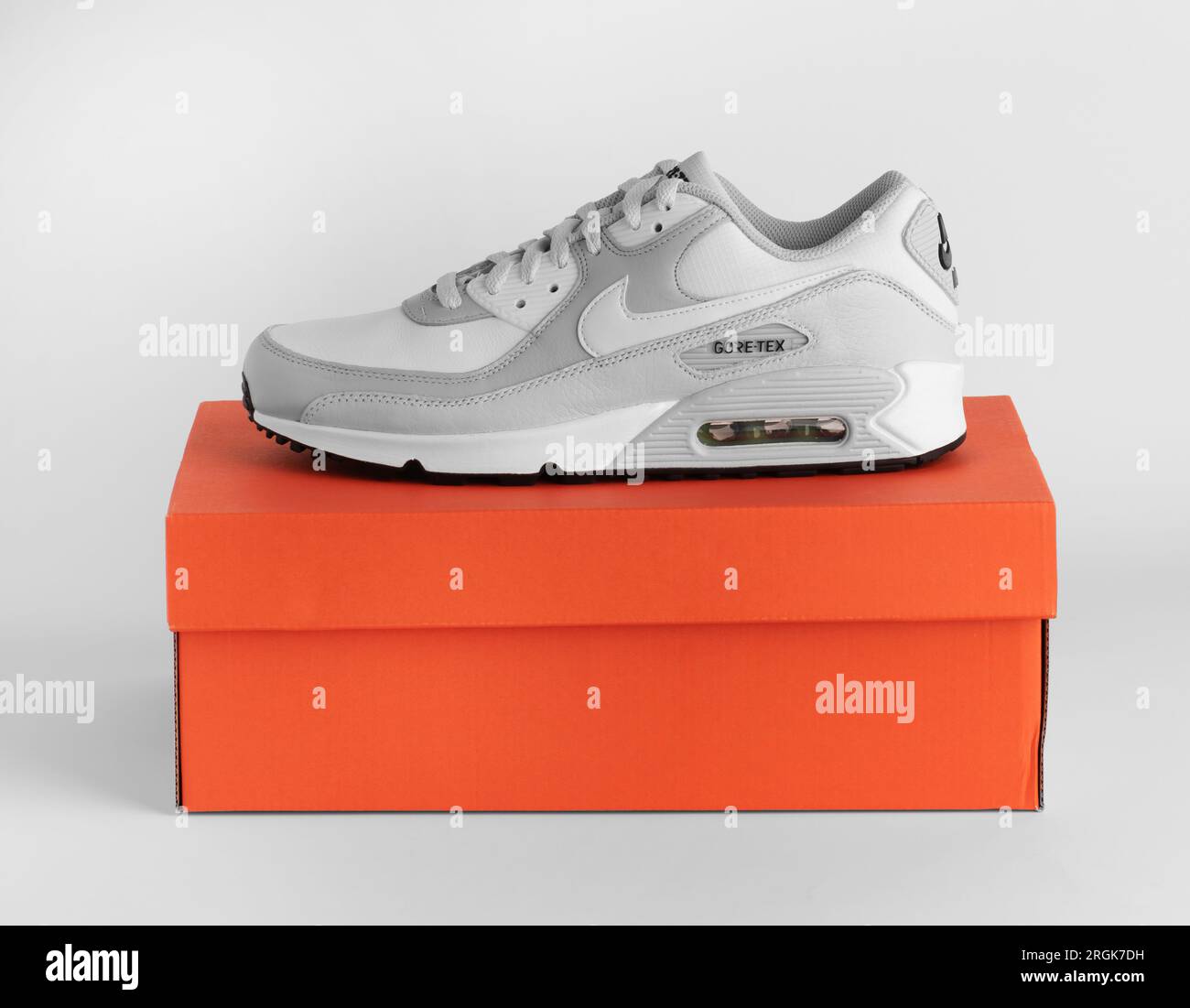 Istanbul, Turkey - April 12, 2023: Nike Air Max 90 GTX model shoes on white background. White and Gray color GORE-TEX shoes. Stock Photo