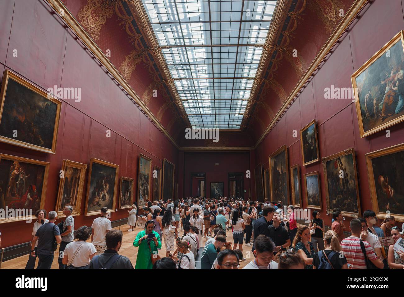 Louvre Museum with Glass Pyramid Entrance in Daylight Stock Photo