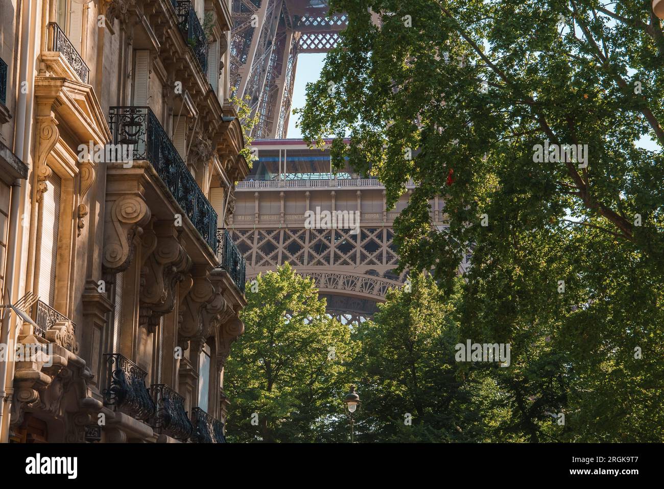 Eiffel Tower View from Sunny Parisian Street Stock Photo