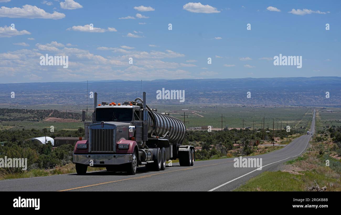 A tanker truck transports crude oil on a highway near Duchesne, Utah on