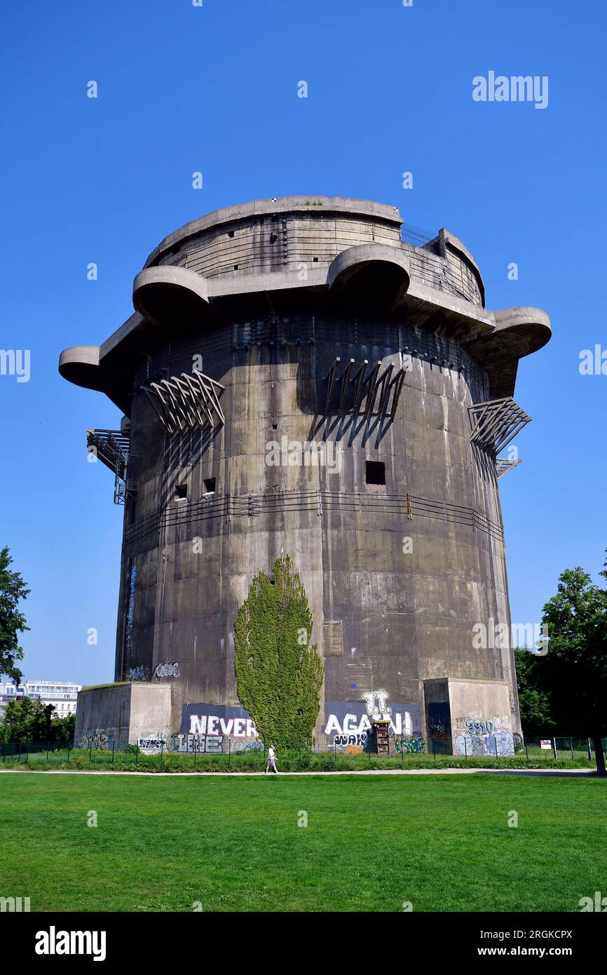 Austria, the public Augarten Park with one of the two flak towers from World War II with an anti-war slogan - never again, the park is a green oasis i Stock Photo